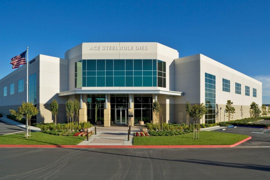 ACE Steel Rule Dies manufacturing facility with American flag